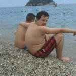 CasaOz - bambini sorridenti in riva al mare